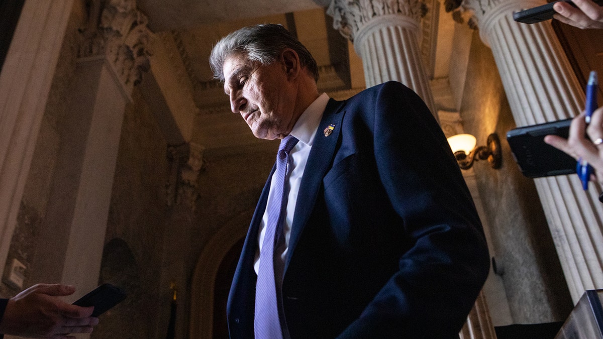 Manchin looking down