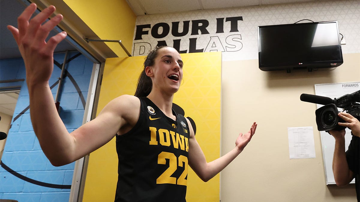 Caitlin Clark celebrates after beating South Carolina