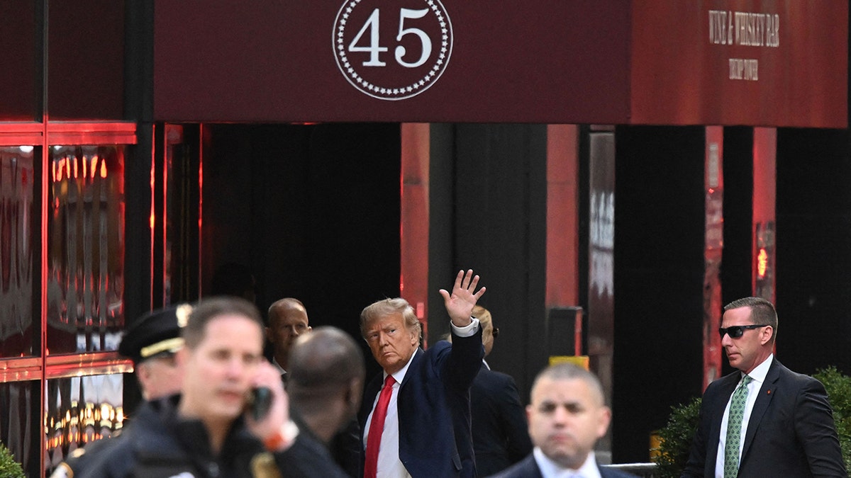 Trump waving