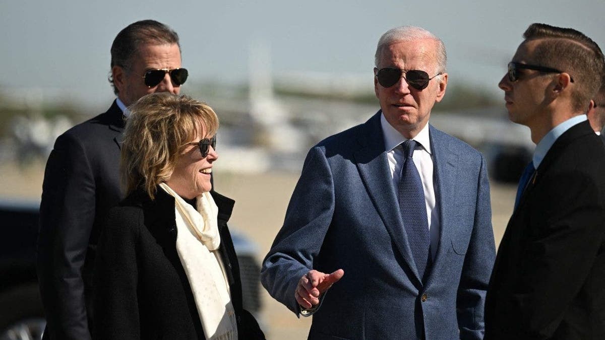 Joe Biden, with his sister Valerie Biden (2nd L), and son Hunter Biden (L)