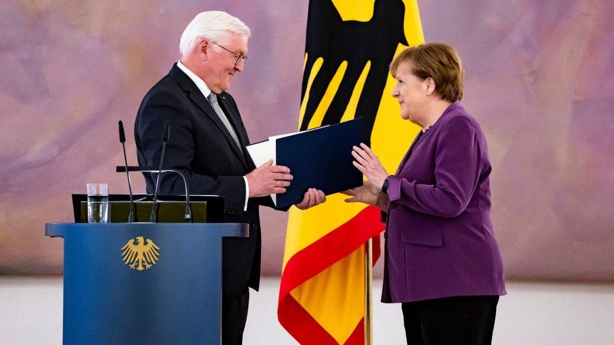 Merkel receives order of merit award