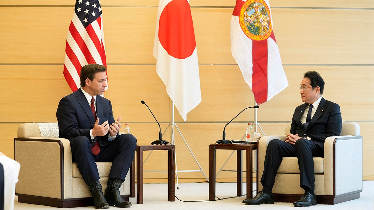 DeSantis sitting with Japan's leader