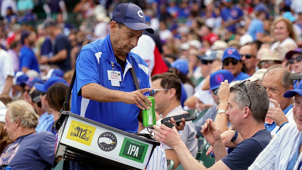 A beer vendor sells beer