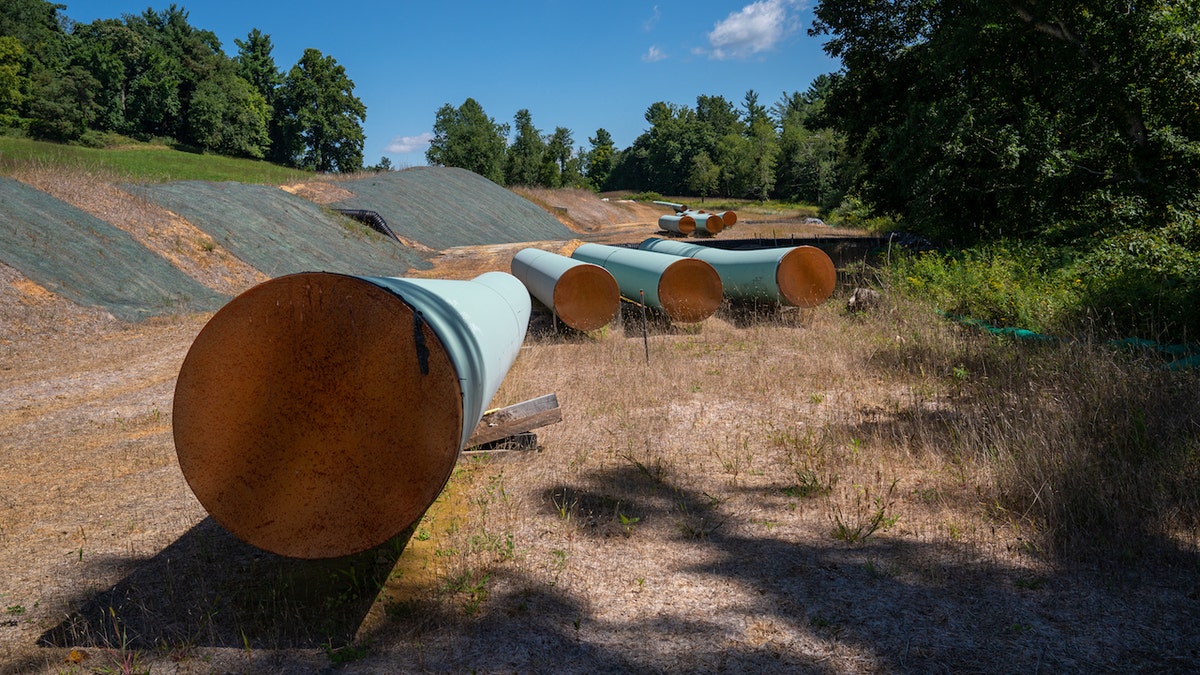 Sections of steel pipe laid out in Virginia