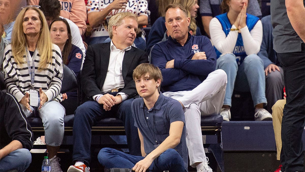 Hugh Freeze attends an Auburn basketball game