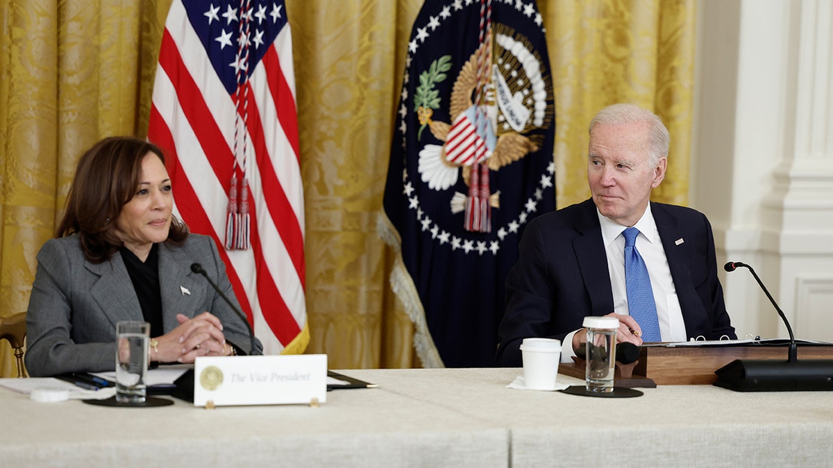 Biden and Harris sitting at a table together