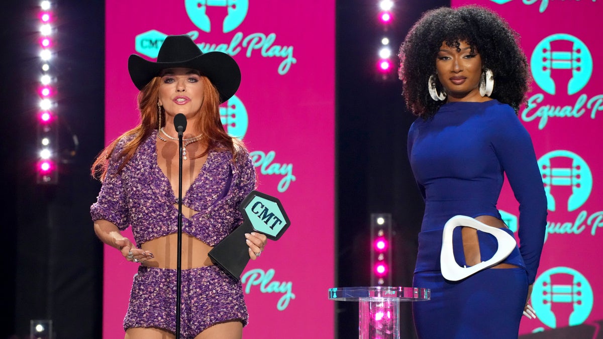 Shania Twain and Megan Thee Stallion on stage at the CMT Music Awards