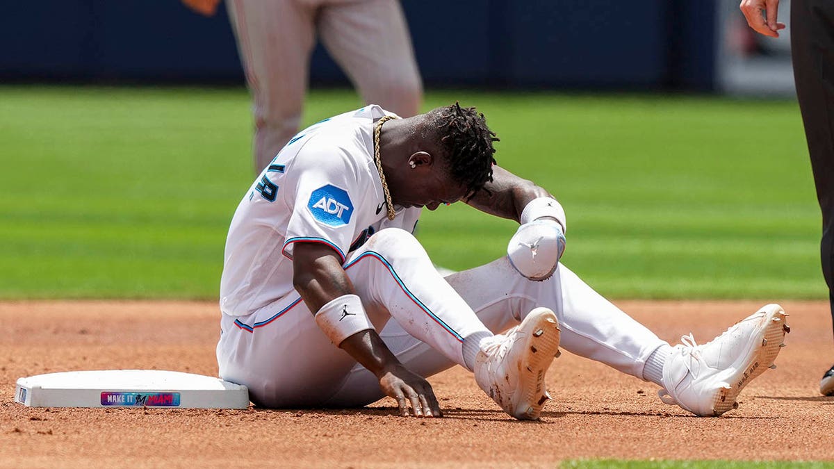 Miami Marlins second baseman Jazz Chisholm Jr. catches a ball hit by Tampa  Bay Rays' Ronny Simon during the third inning of a spring training baseball  game, Saturday, March 11, 2023, in