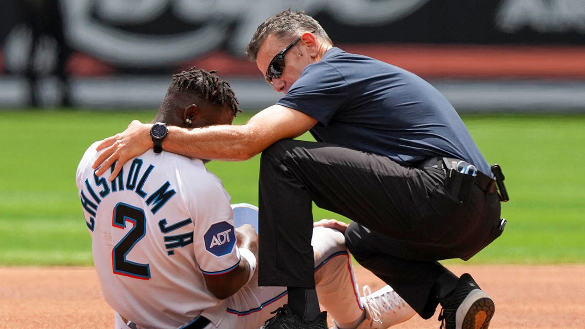 Marlins' Jazz Chisholm Jr. exits with injury after steal attempt