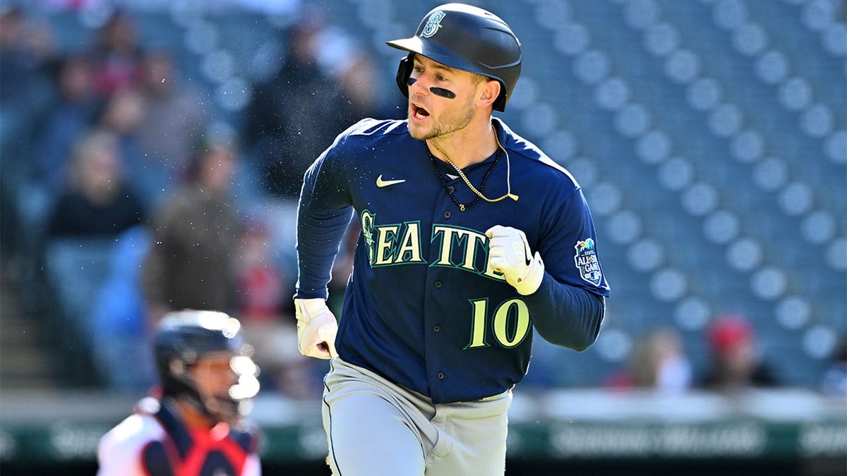 Jarred Kelenic hits a double against the Guardians