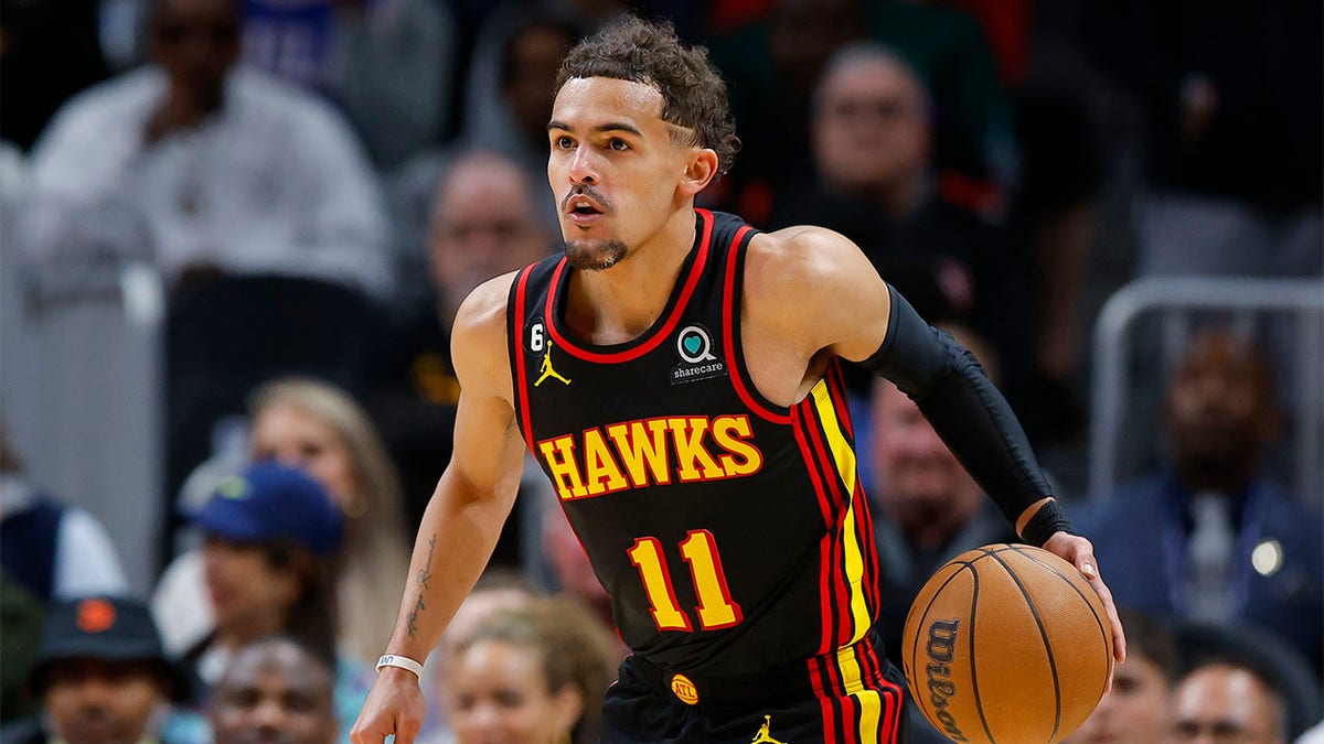 Trae Young plays against the Sixers