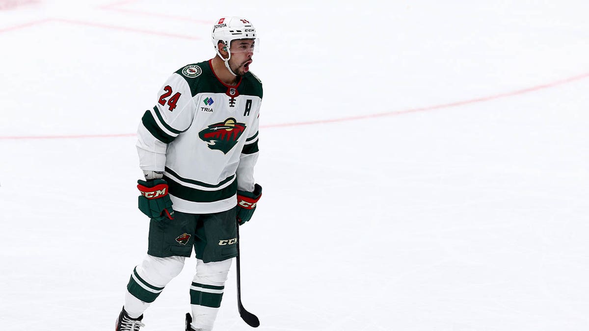 Matt Dumba celebrates after defeating the Stars in round one, game one of the Stanley Cup playoffs