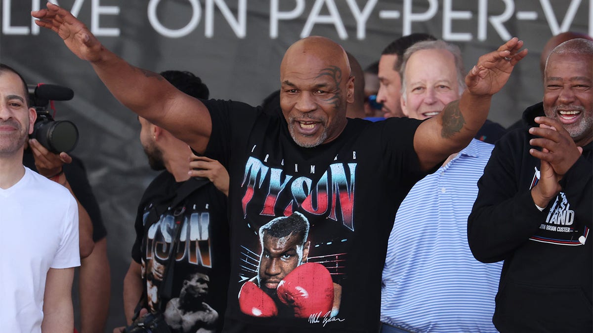 Mike Tyson acknowledges the crowd