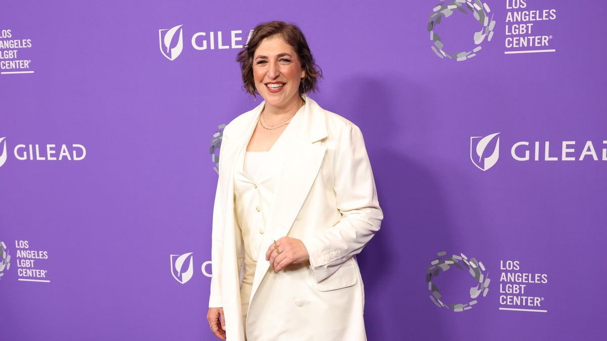 Mayim Bialik in a white suit