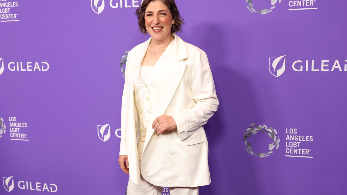 Mayim Bialik in a white suit