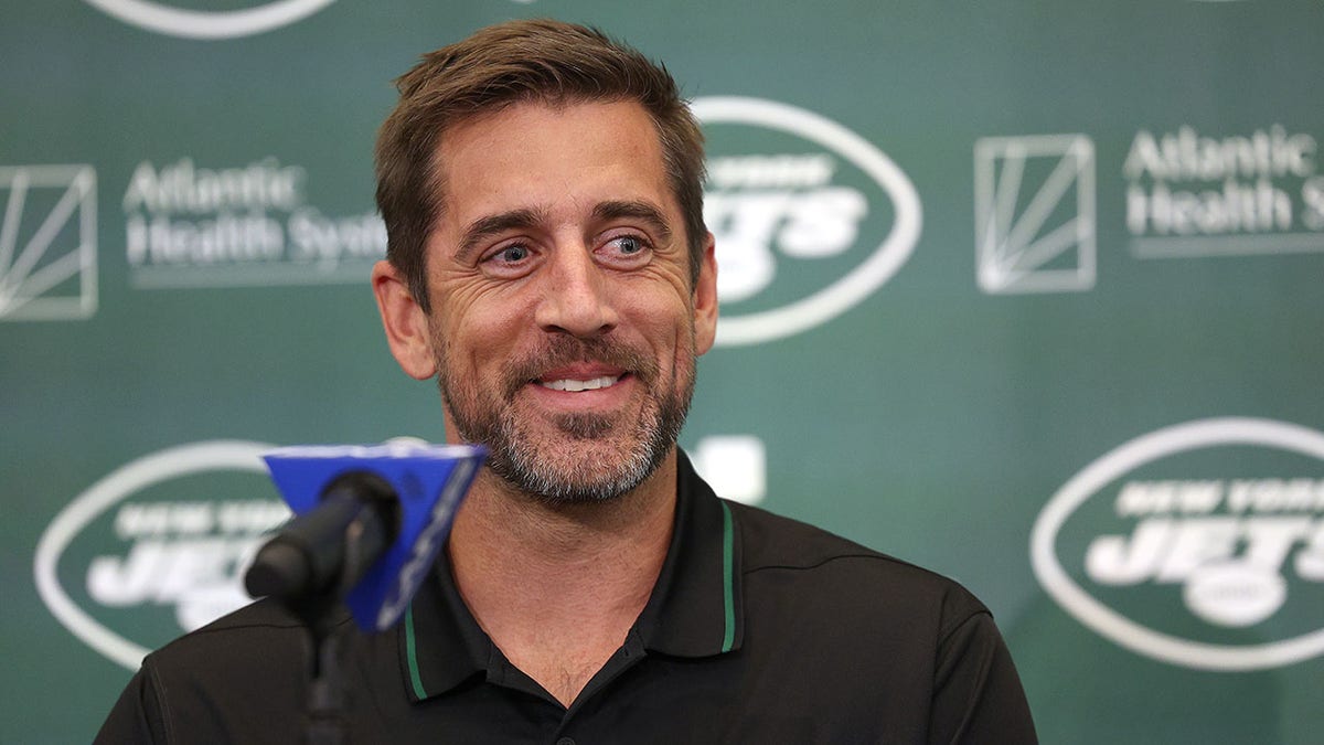 Aaron Rodgers attends an introductory press with the Jets