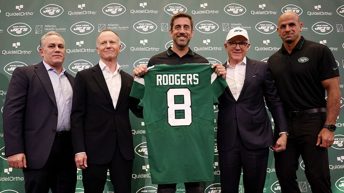 Jets ownership poses for a picture