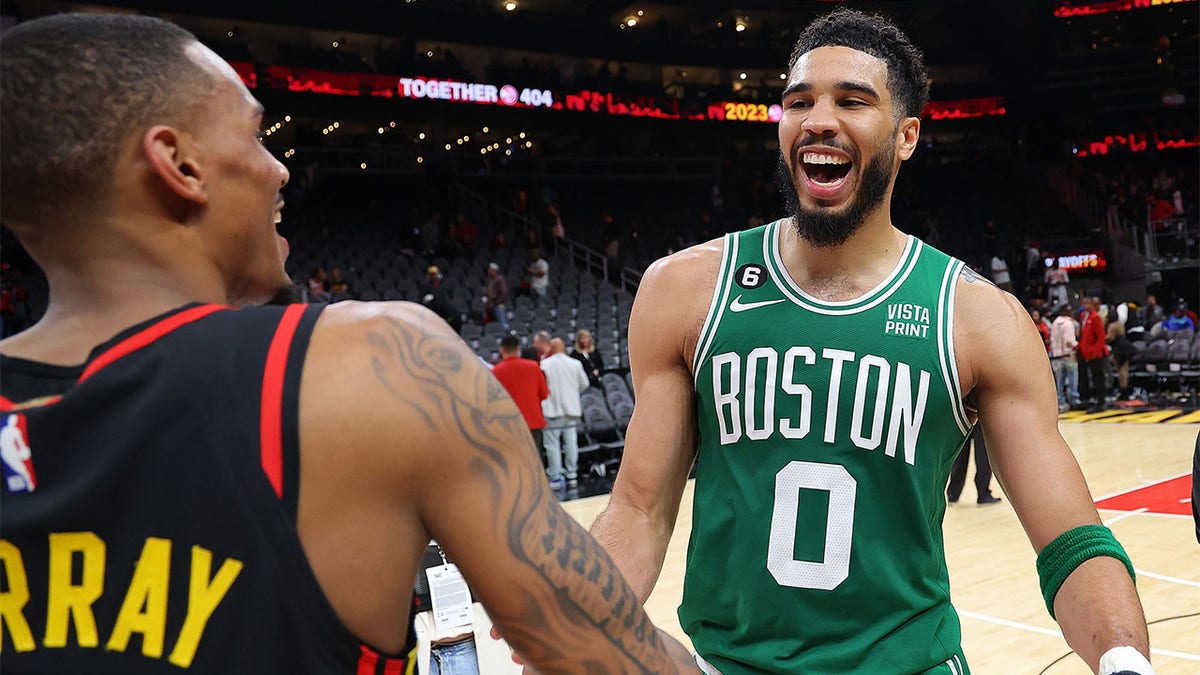 Jayson Tatum reacts after beating the Atlanta Hawks