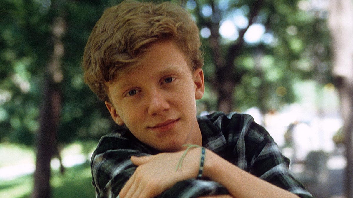 Anthony Michael Hall posing for pictures in 1984