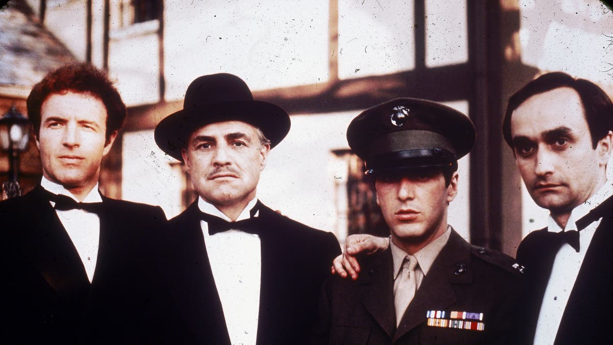 James Caan, Marlon Barndo, Al Pacino, and John Cazale in character in a scene from "The Godfather."