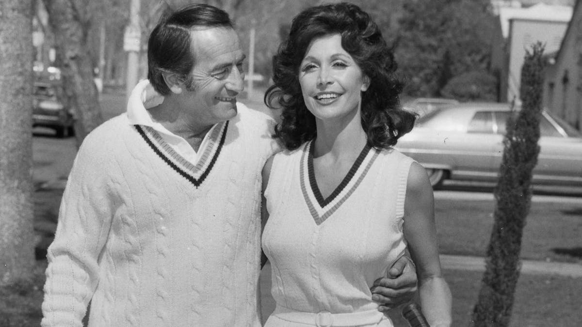 John Beradino and his wife Marjorie Binder walking outside
