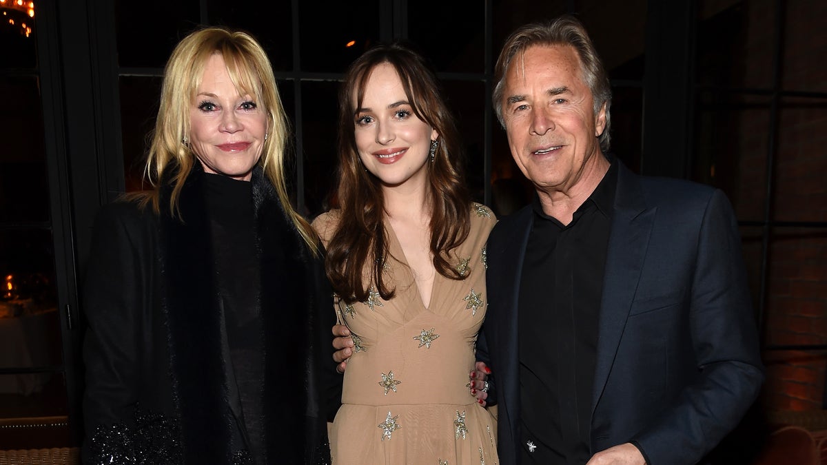 Melanie Griffith, Don Johnson and Dakota Johnson pose together