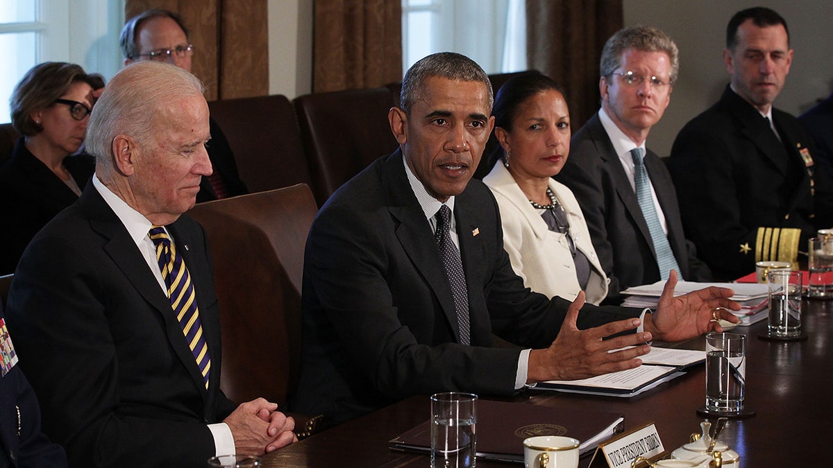 Susan Rice at table with Obama