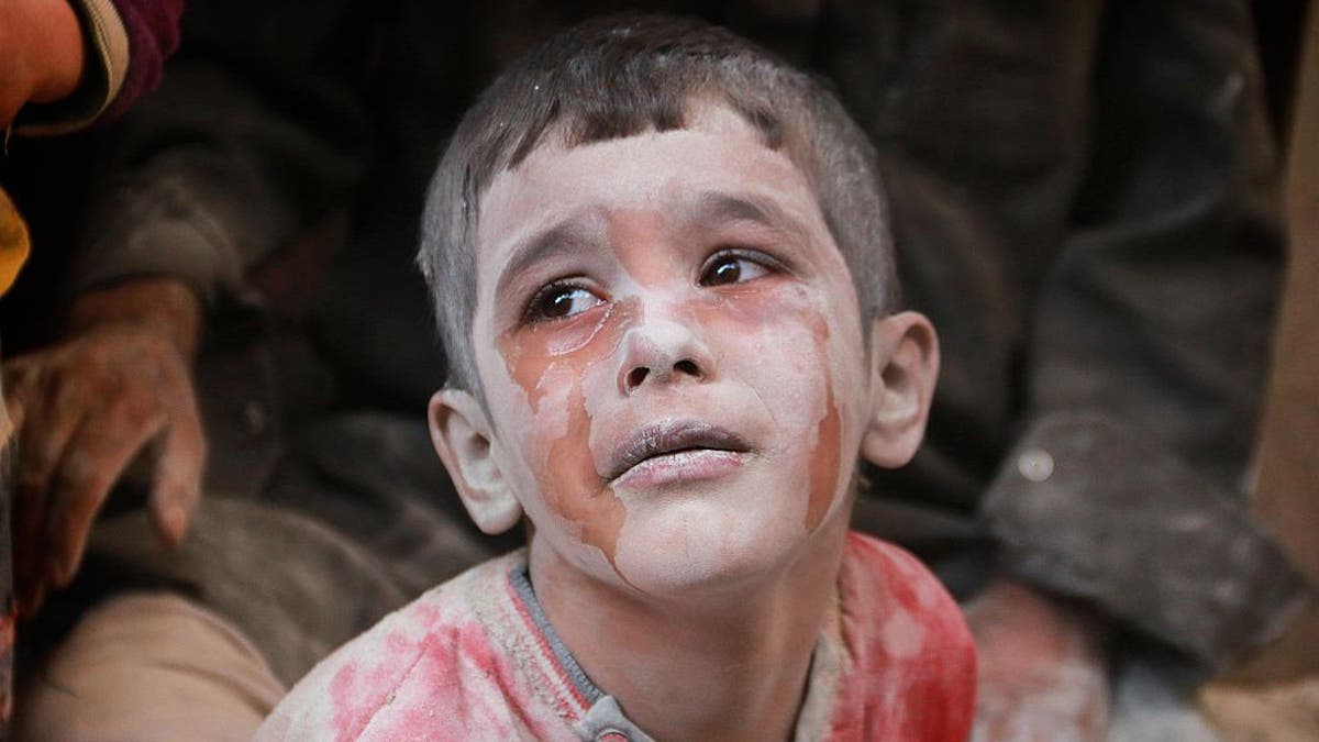 Syrian boy crying