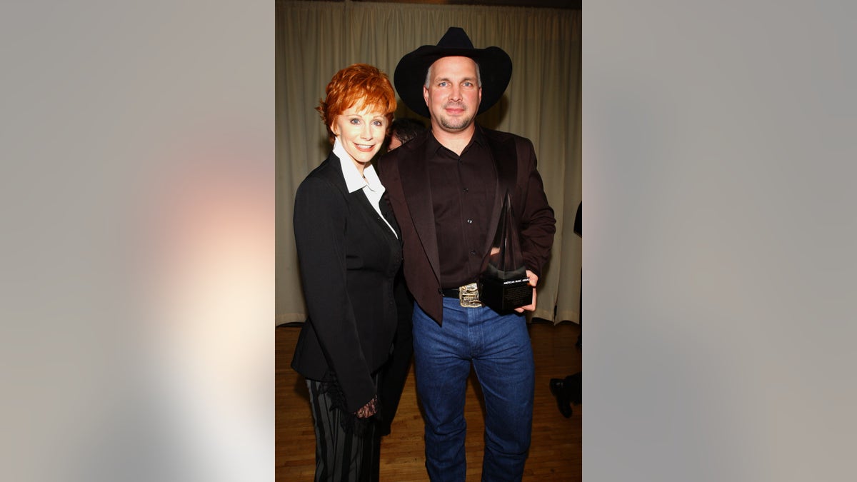 Reba McEntire with Garth Brooks