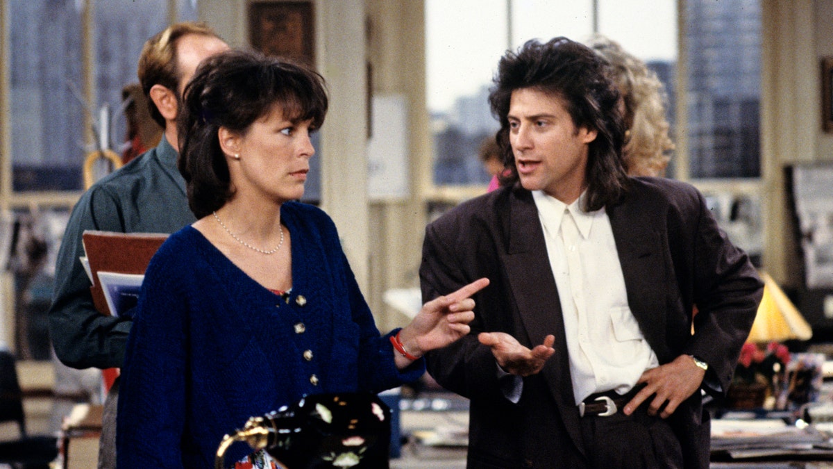 Jamie Lee Curtis and Richard Lewis in a scene from "Anything but Love"