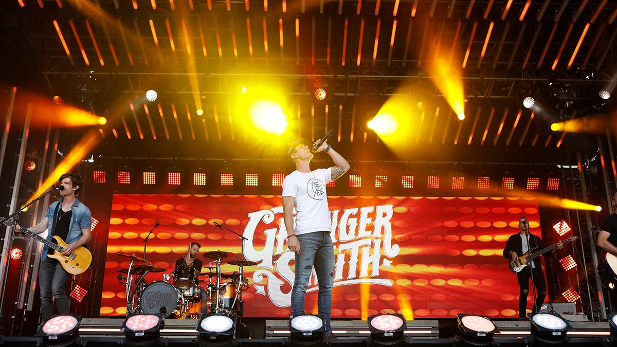 Granger Smith singing country music on stage