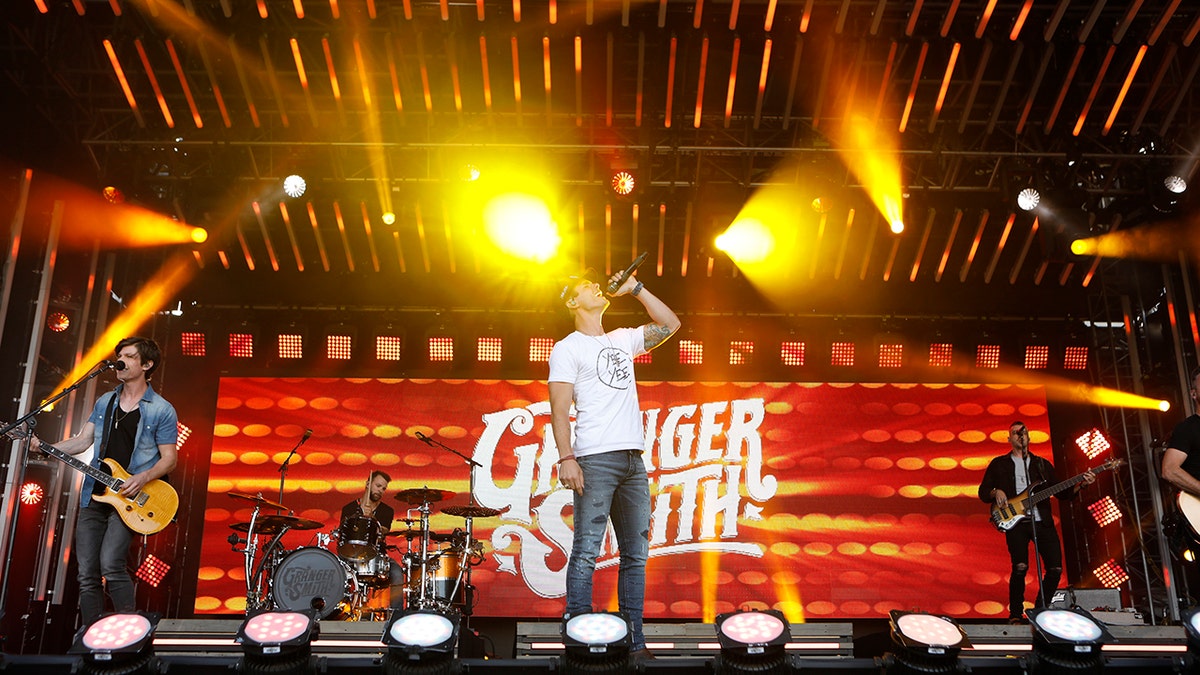 Granger Smith singing country music on stage