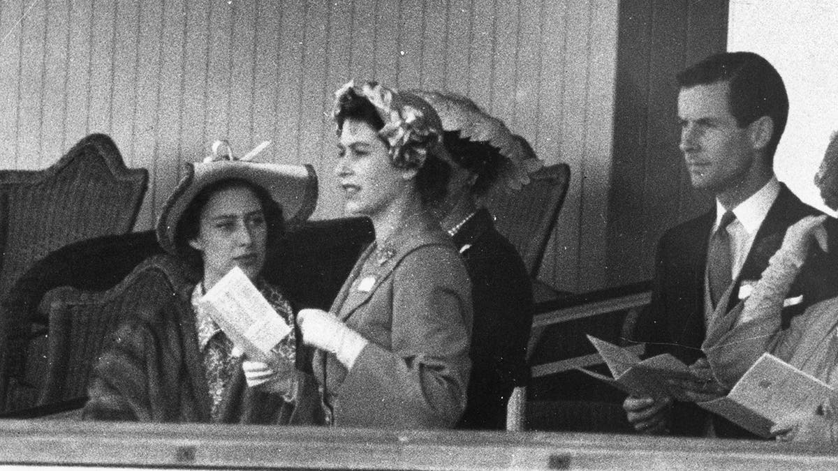 Princess Elizabeth and Group Captain Peter Townsend in the Royal Box at Ascot.