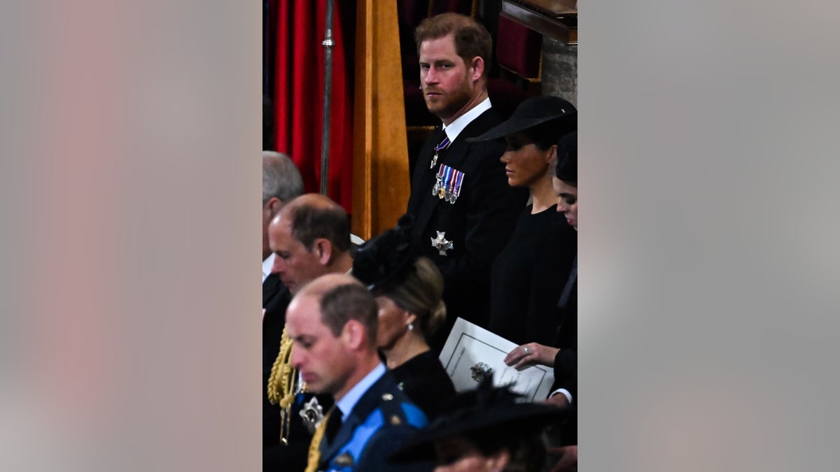 Prince Harry in a morning suit looking ahead during queen elizabeths funeral