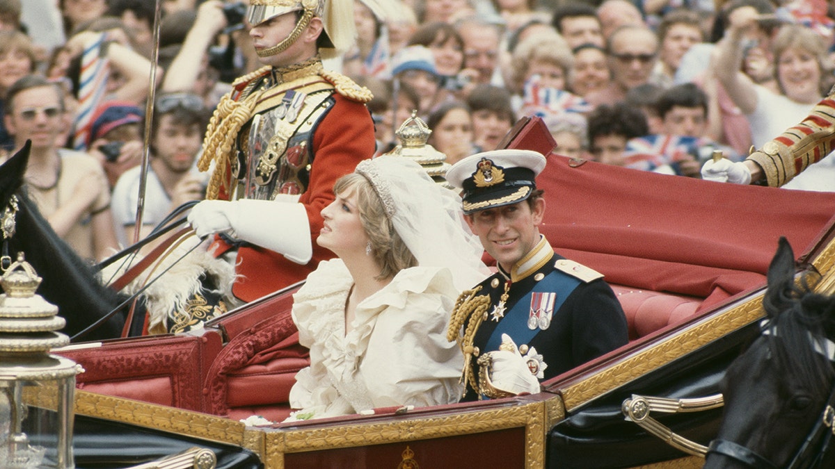 Princess Diana on a royal carriage during her wedding to Prince Charles
