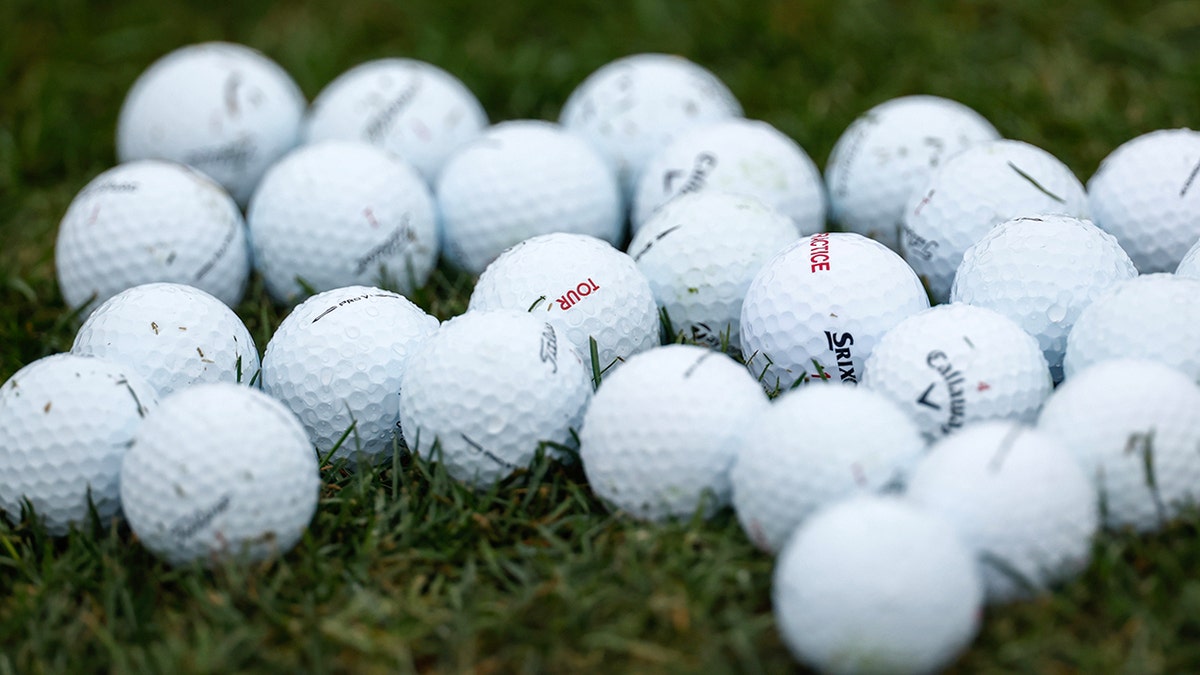 Golf Balls laying on grass