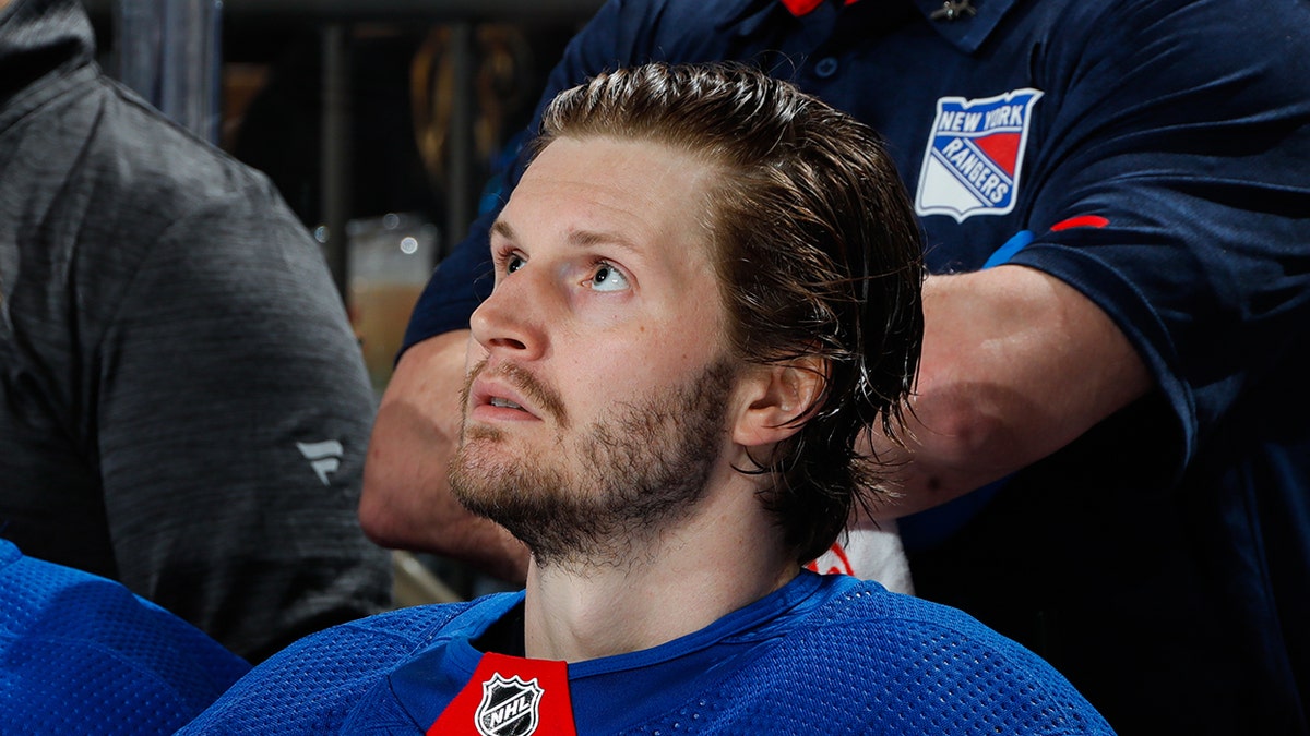 Jacob Trouba looks up on ice