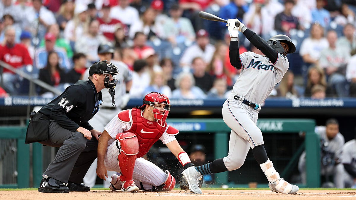 Miami Marlins player swings at a pitch