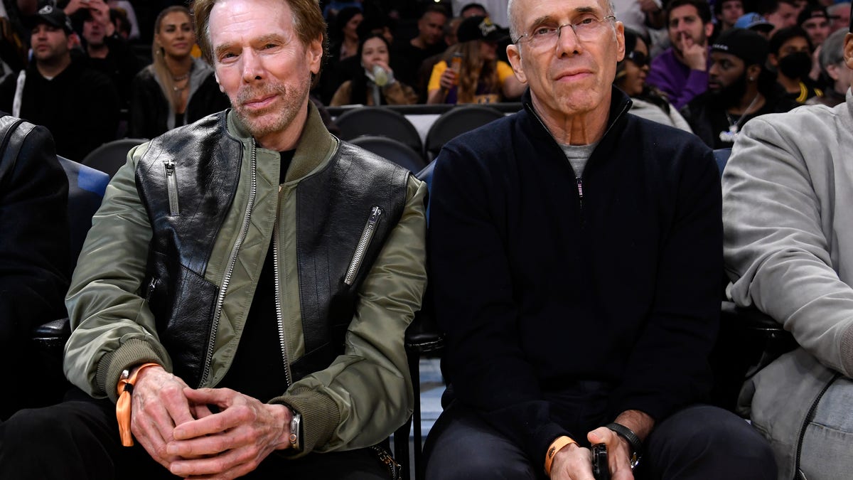 Jerry Bruckheimer (L) and Jeffrey Katzenberg attend a basketball game between the Dallas Mavericks and the Los Angeles Lakers at Crypto.com Arena on March 17, 2023 in Los Angeles, Calif.