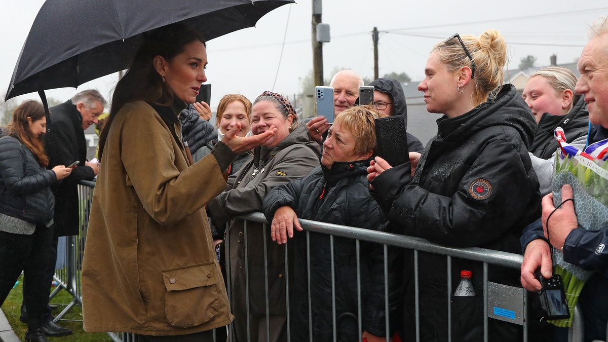 Kate Middleton talks to a crowd