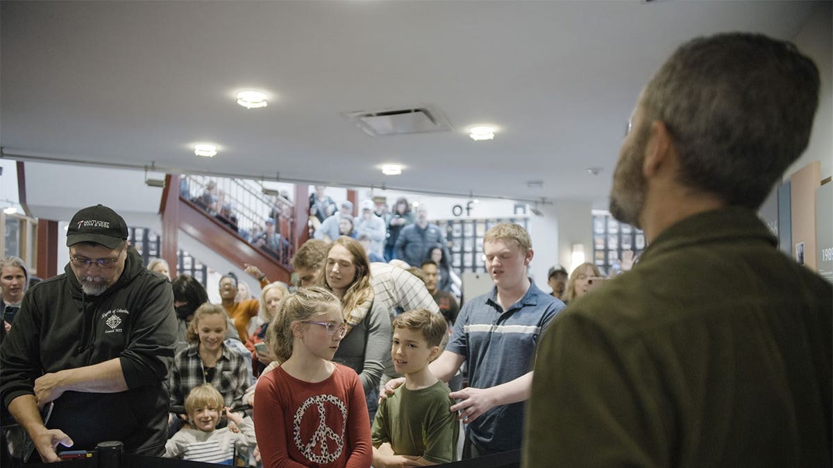 Kirk Cameron facing a crowd.