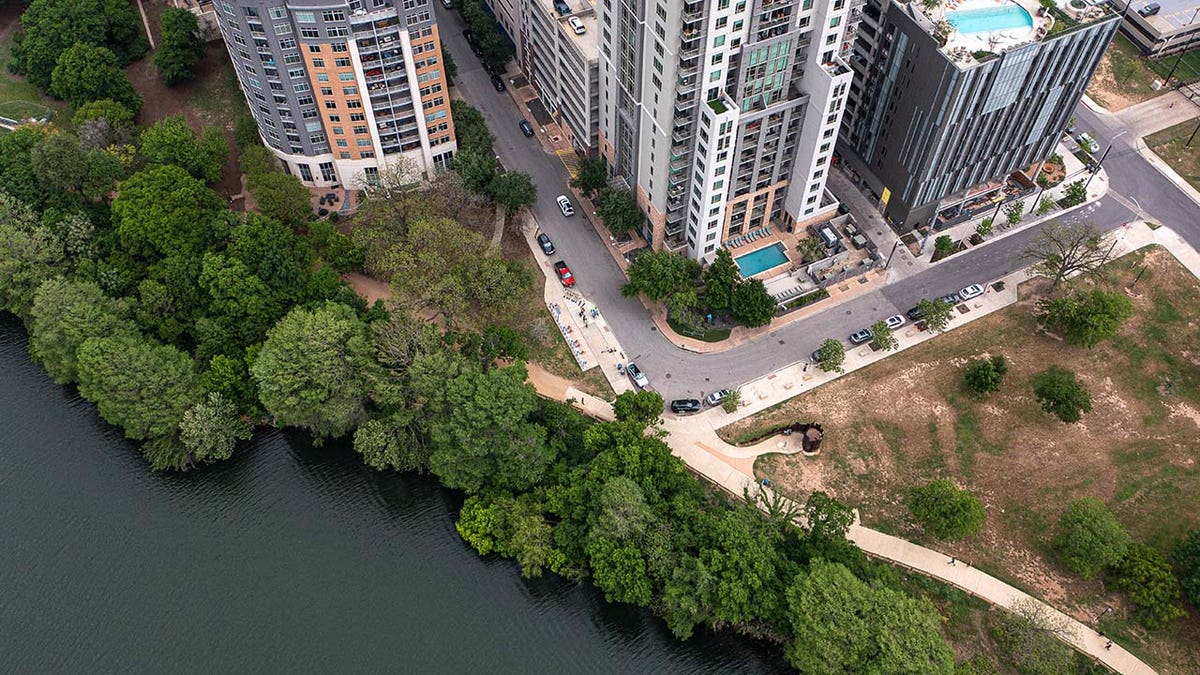 A drone shot of hike and bike trail along Lady Bird Lake