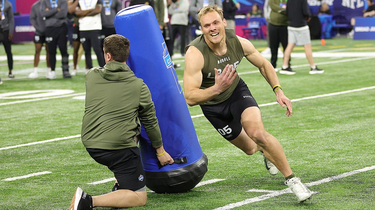 Linebacker Jack Campbell goes through drills 