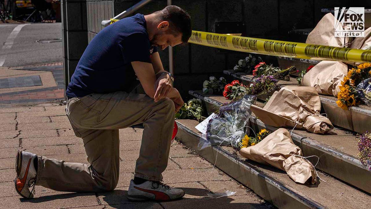 Community members set up a memorial at Old National Bank in downtown Louisville