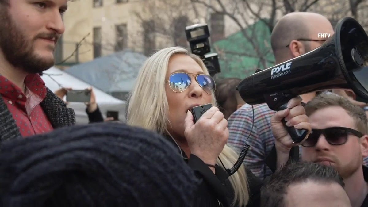 Marjorie Taylor Greene sends message to Eric Adams with bullhorn in hand ahead of Trumps arraignment