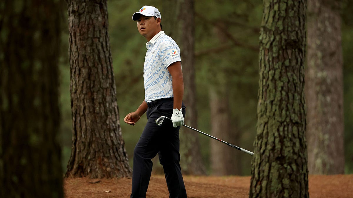 Si Woo Kim looks on from the first hole during the second round