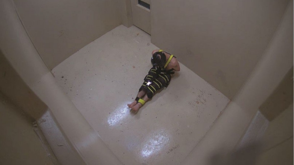 Joshua McLemore in a 'wrap' solitary confinement
