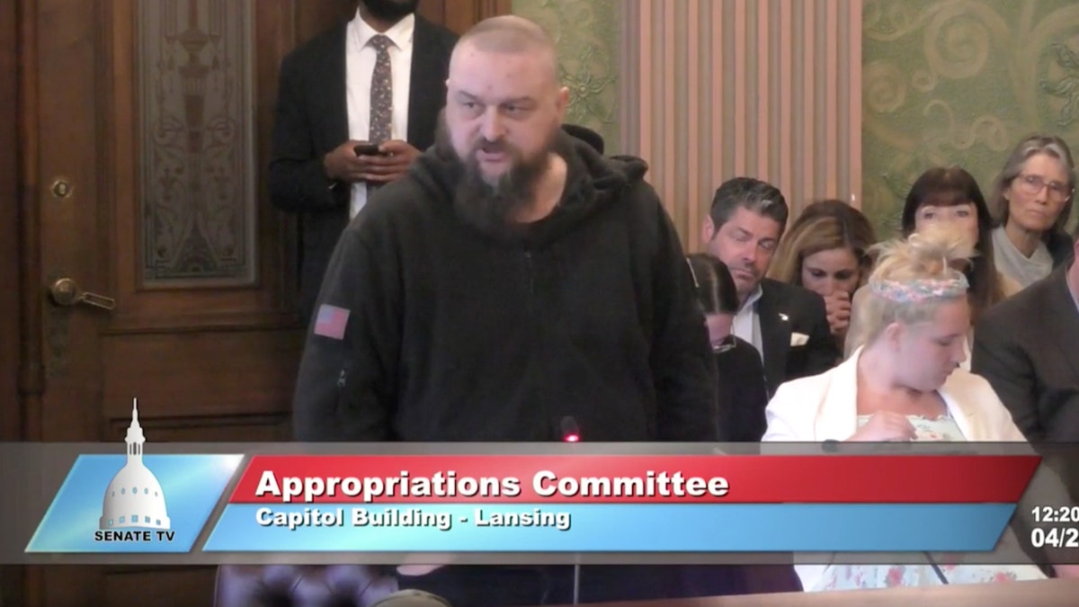 A Michigan resident speaks during the hearing Thursday, arguing the money Gotion earns from the project would "go home to China" and be used as a weapon.