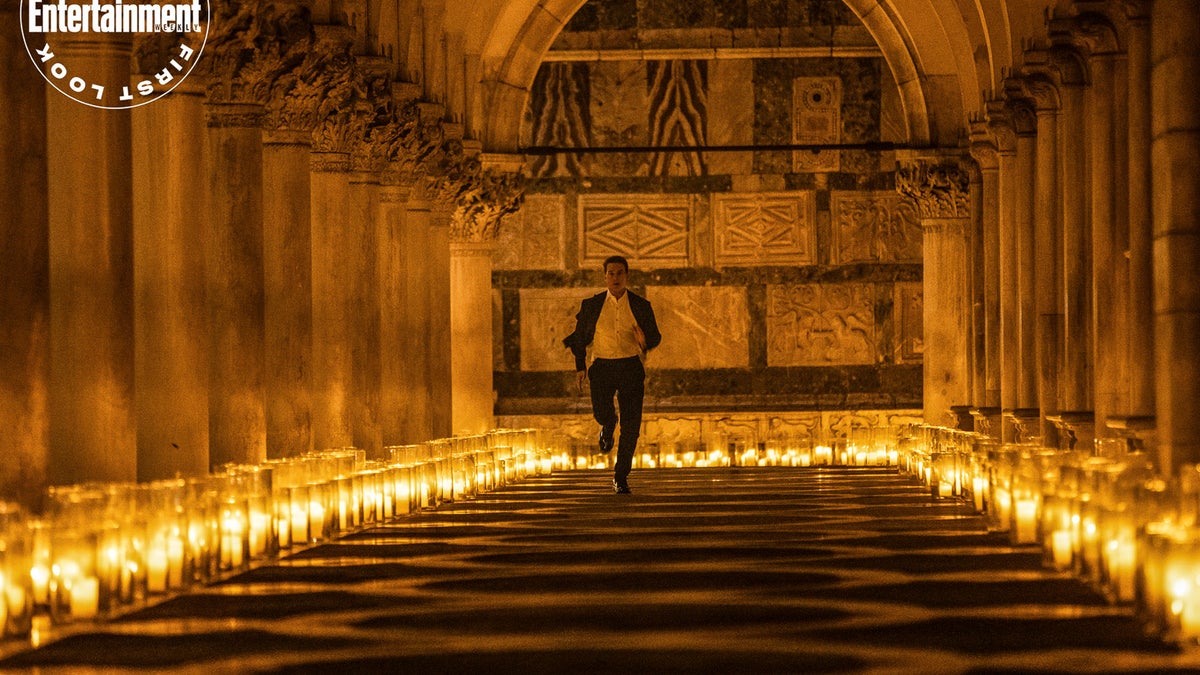 tom Cruise running in candlelit church in Mission Impossible