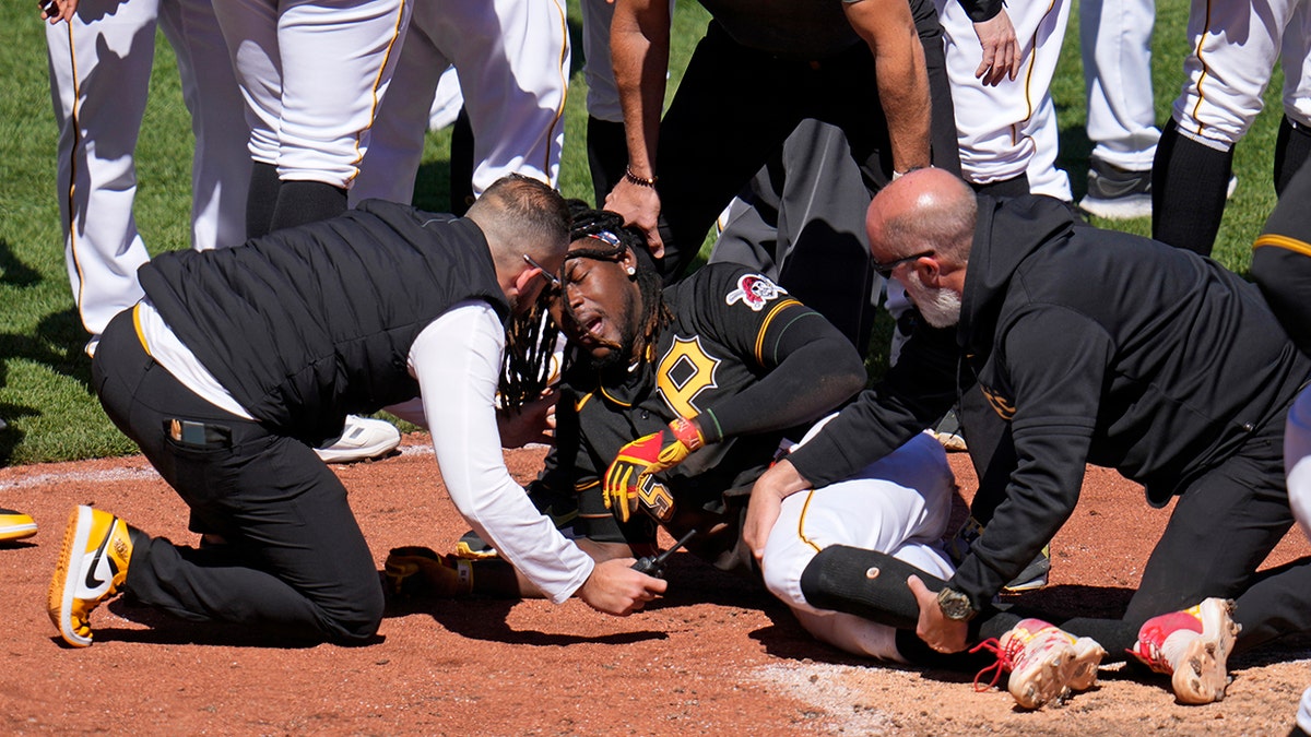 Baseball teams brawl after sickening plate collision leaves Oneil